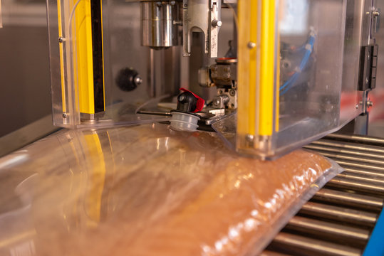  Apple direct juice after pressing. Bottling on a machine in bag in box
