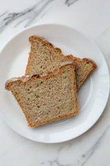 Directly above shot of two slices of bread on plate