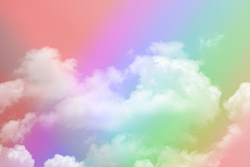 Obraz na płótnie Canvas beauty soft rainbow abstract pink sweet pastel with fluffy clouds on sky. multi color image. beautiful fantasy growing love light shade.