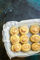 bun roll cinnamon, home baked goods Menu concept healthy eating. food background top view copy space for text healthy eating table setting