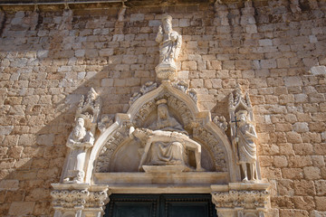 Fototapeta na wymiar Stone detail of a facade in Dubrovnik, formerly Ragusa, city located on the Dalmatian coast, Croatia, Europe