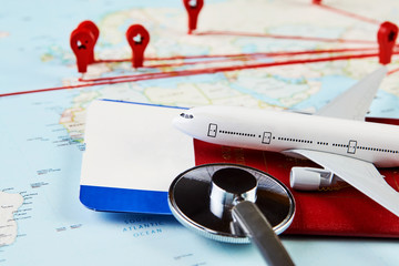 Medical travel concept with stethoscope passport document