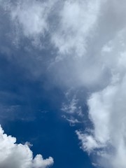 Fototapeta na wymiar Large white cloud on the blue sky background