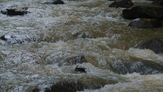 a mountain river rushing downhill