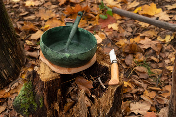 Angle view of dishes and a knife. Utensils and appliances in nature.