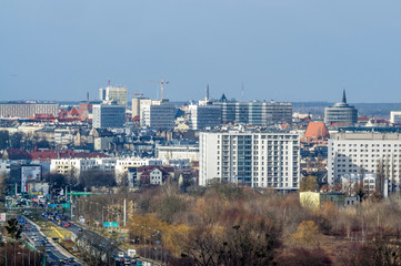 Fototapeta na wymiar Poznań, a panorama of the city from a long distance from the Czecha estate, the photo shows the center from the east