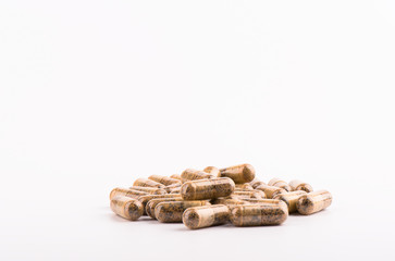 Capsules with medicine or vitamins on a white background. Health concept.