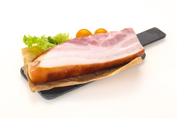 Smoked pork breast with salad leaves