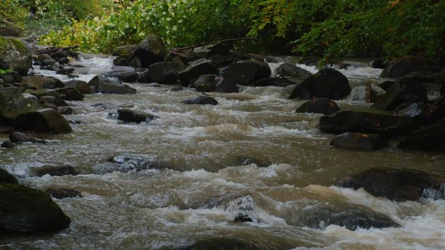 a mountain river rushing downhill