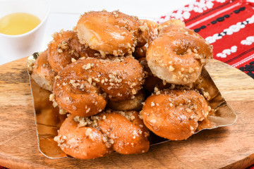 Concept of romanian cuisine. Homemade Mucenici, traditional desserts made in the figure 8