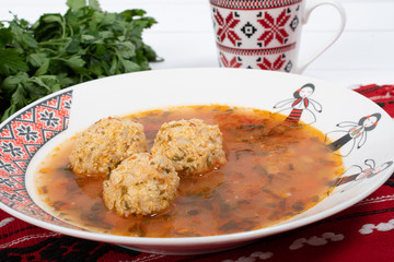 Top view of plate with meatballs soup, traditional plate of the Romanian cuisine,ciorba de perisoare