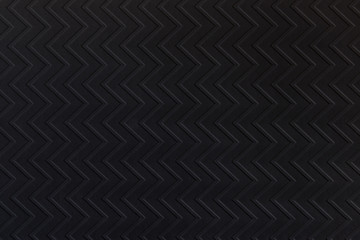 Black zigzag textured paper. Modern background suitable for any design.