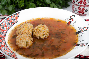 Top view of plate with meatballs soup, traditional plate of the Romanian cuisine,ciorba de perisoare