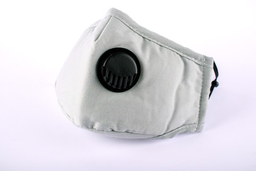 Medical mask with valve isolated on white background. Protection Coronavirus and viruses. Health...