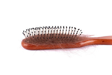 Hair brush. The problem of hair loss. Health concept.