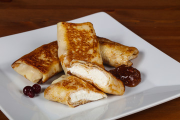 Pancakes stuffed curd with jam