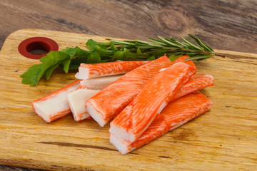 Crab stick surimi over board