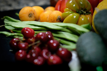 Fruit presentation with various colorful fresh fruits and vegetables