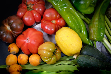 Fruit presentation with various colorful fresh fruits and vegetables