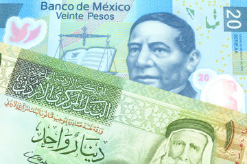 A blue twenty Mexican peso bank note with a one dinar bill from Jordan, close up in macro
