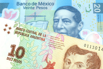 A ten peso bill from Argentina, close up in macro with a blue twenty peso bank note from Mexico