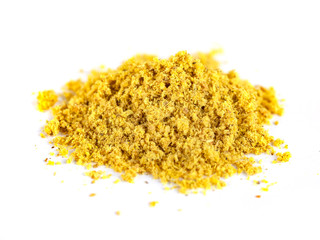 Orange curry spice isolated on the white background