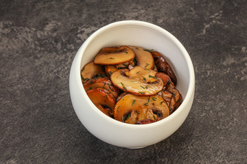 Roasted champignon with herbs and spices