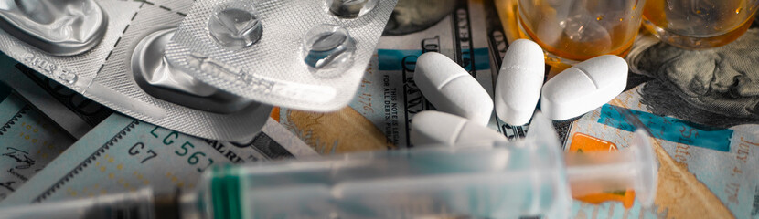 Drug smuggling.Vials of antibiotic, anti-virus tablets, and a syringe for injection. Buying or...