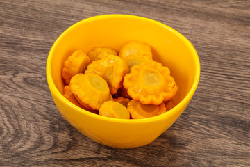 Marinated yellow patisson in the bowl