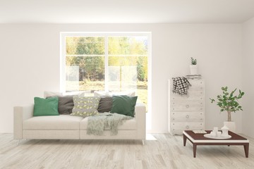 Naklejka premium White living room with sofa and summer landscape in window. Scandinavian interior design. 3D illustration