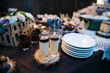 Candy Bar close up. Delicious sweet buffet with cupcakes. Sweet wedding buffet with cupcakes and other desserts.