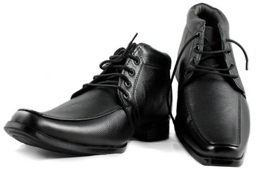leather black formal shoes with white background