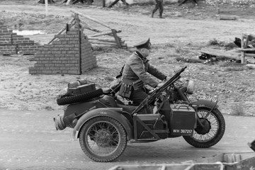 Black and white photography, reconstruction of a military battle World War II