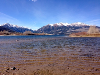 Snow-Tipped Mountains and River in Colorado