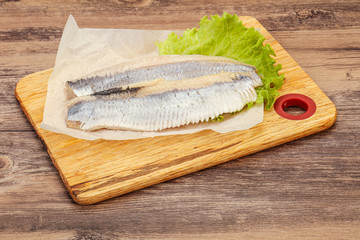Herring fillet with salad leaves