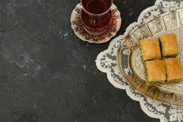 The Turkish traditional dessert Baklava and cologne concept for Muslim Ramadan festival.