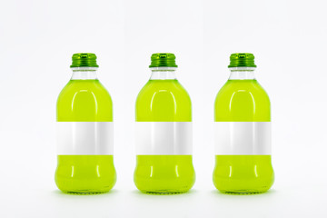 A bottle of juice with cap on a white background.Can be use for your design.High resolution photo.Set of Bottles.Mock-Up.Blank Label