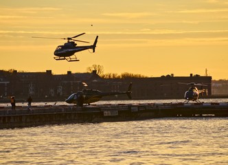 Helicopter transportation at sunset