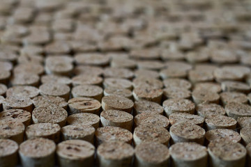 Close-up of homemade chopped wine cork note board, selective focus