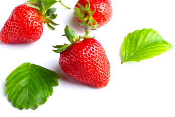 Juicy and beautiful strawberries on isolated white background