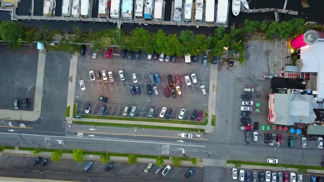 Descending Bird's Eye View of TGI Fridays and the Parking Lot