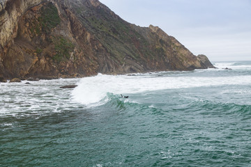 Fototapeta premium Surfer in the bay