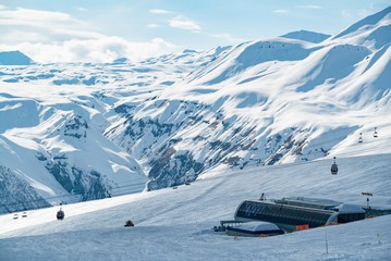 Fototapeta na wymiar Aerial drone Gudauri ski resort in winter. Caucasus mountains in Georgia