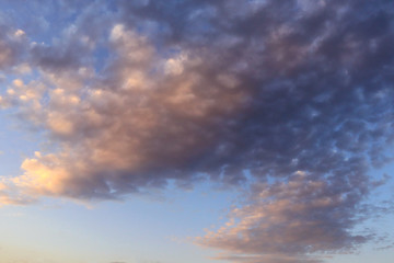 Colorful clouds on blue sky at sunset