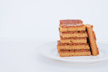 Freshly baked blondie brownie dessert slices, close up.