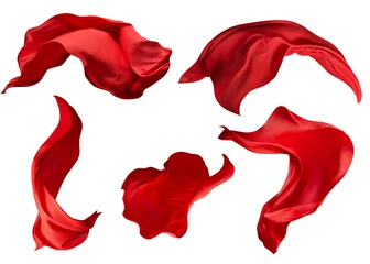 Foto op Plexiglas Red fabric flying on the wind. Isolated on white background © yanokon