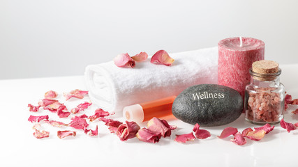 Wellness spa decoration with salt and dried rose petals