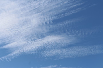 Cloud formation and blue sky. Cloudscape. blue and white streaky cloud formations.