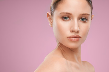 Young attractive blonde woman posing in studio.