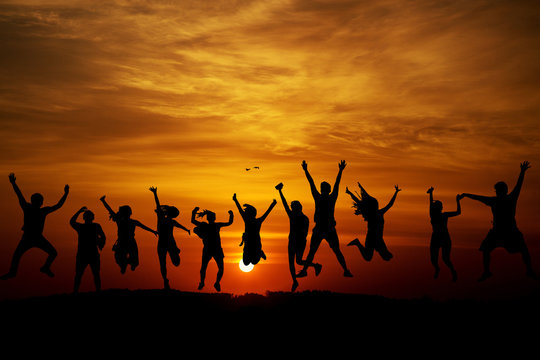 silhouettes of dancing people